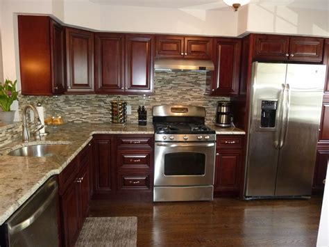 mocha or mahogony cabinets with stainless steel appliances|matching kitchen cabinets with black.